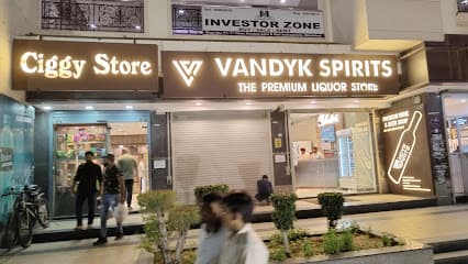 Luxury whisky and wine display inside premium liquor store Vandyk Spirits Noida