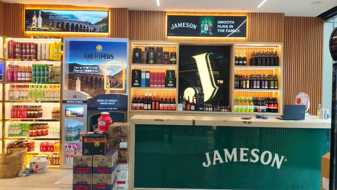 Premium liquor store with wide whisky, wine, and beer collection