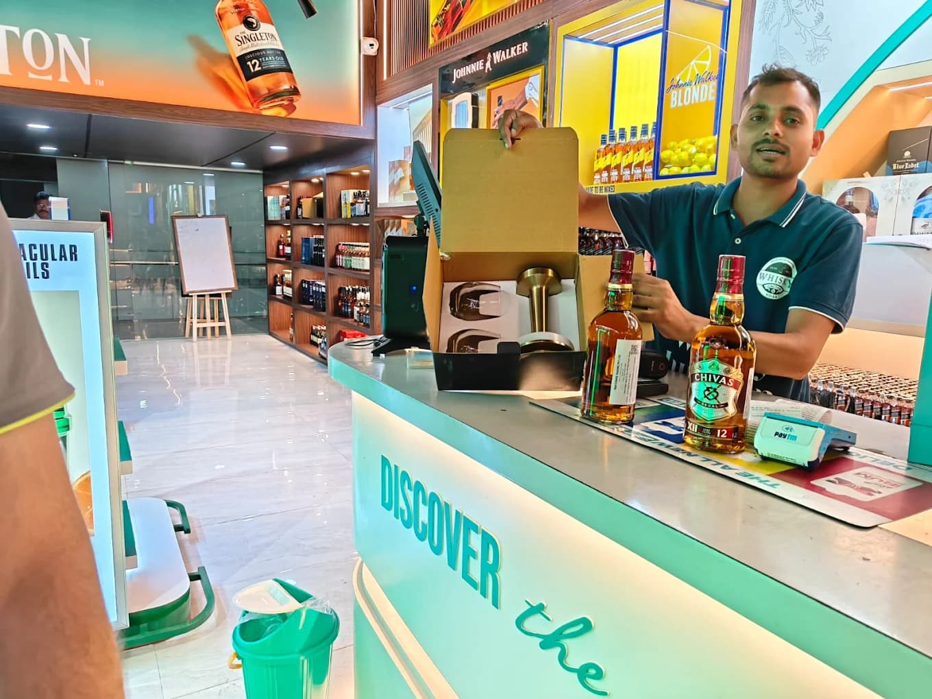 Luxury alcohol retail theka in Noida with expert staff and hygienic interiors