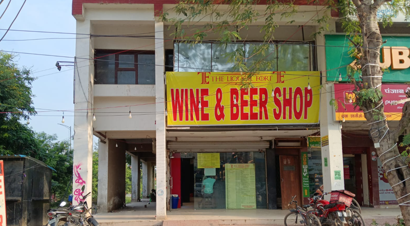 Premium liquor shelves with whisky, rum, vodka