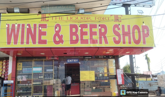 Premium liquor shelves with whisky, rum, vodka