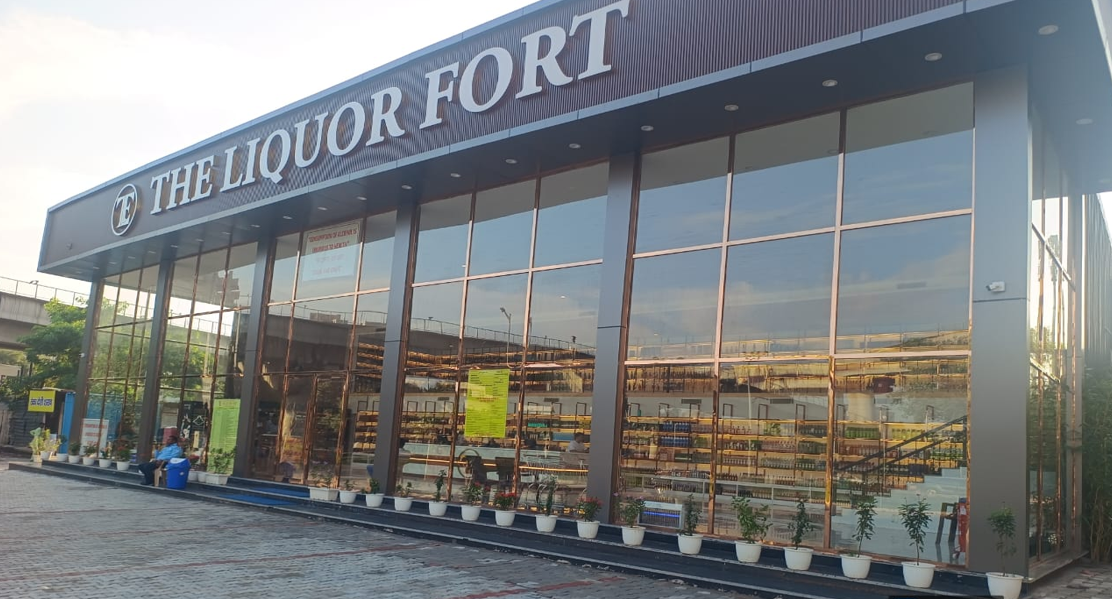 Premium liquor shelves with whisky, rum, vodka