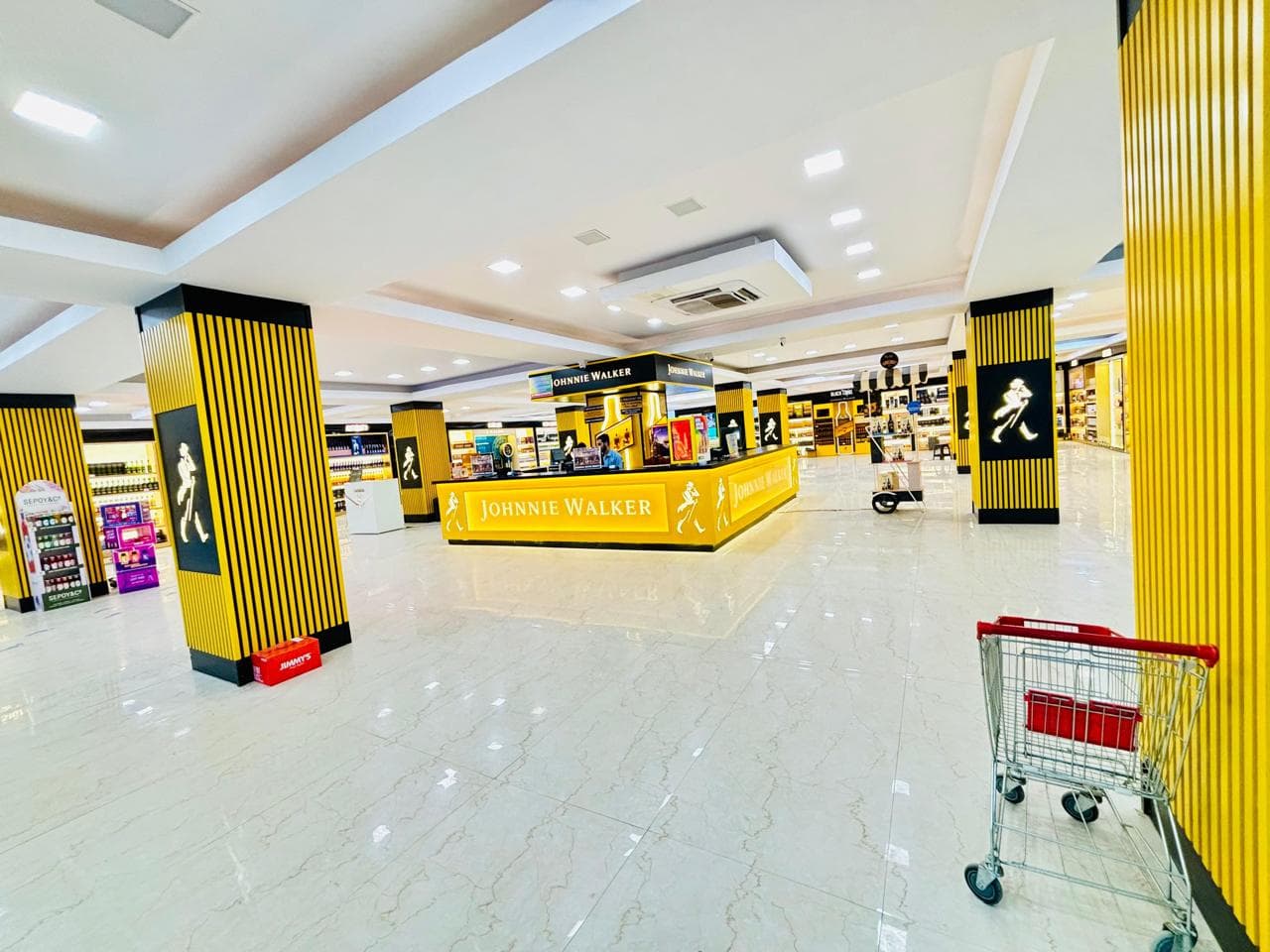 Premium spirits and product racks inside G-Town Wines liquor store on Manesar Khoh Road