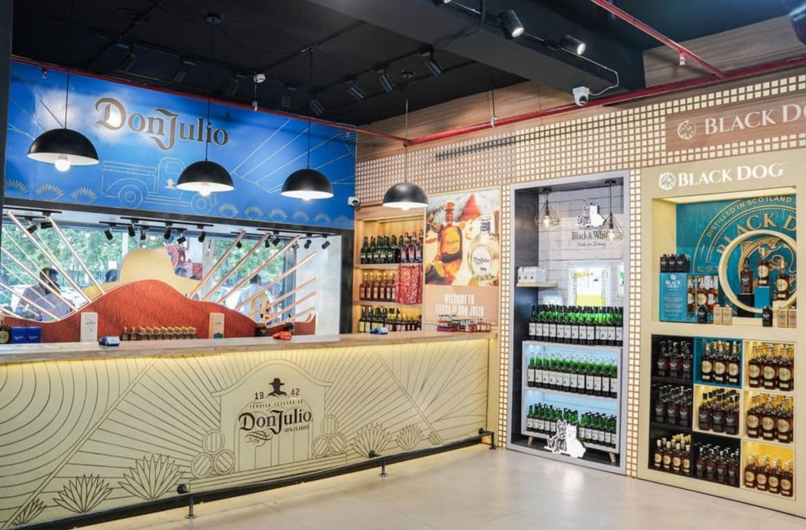 Luxury alcohol retail space with iconic brand displays